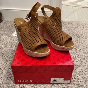 Guess wedges size 7, 4 1/2 inch heels, Brown, Like new in box.